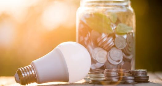 money jar and light bulb