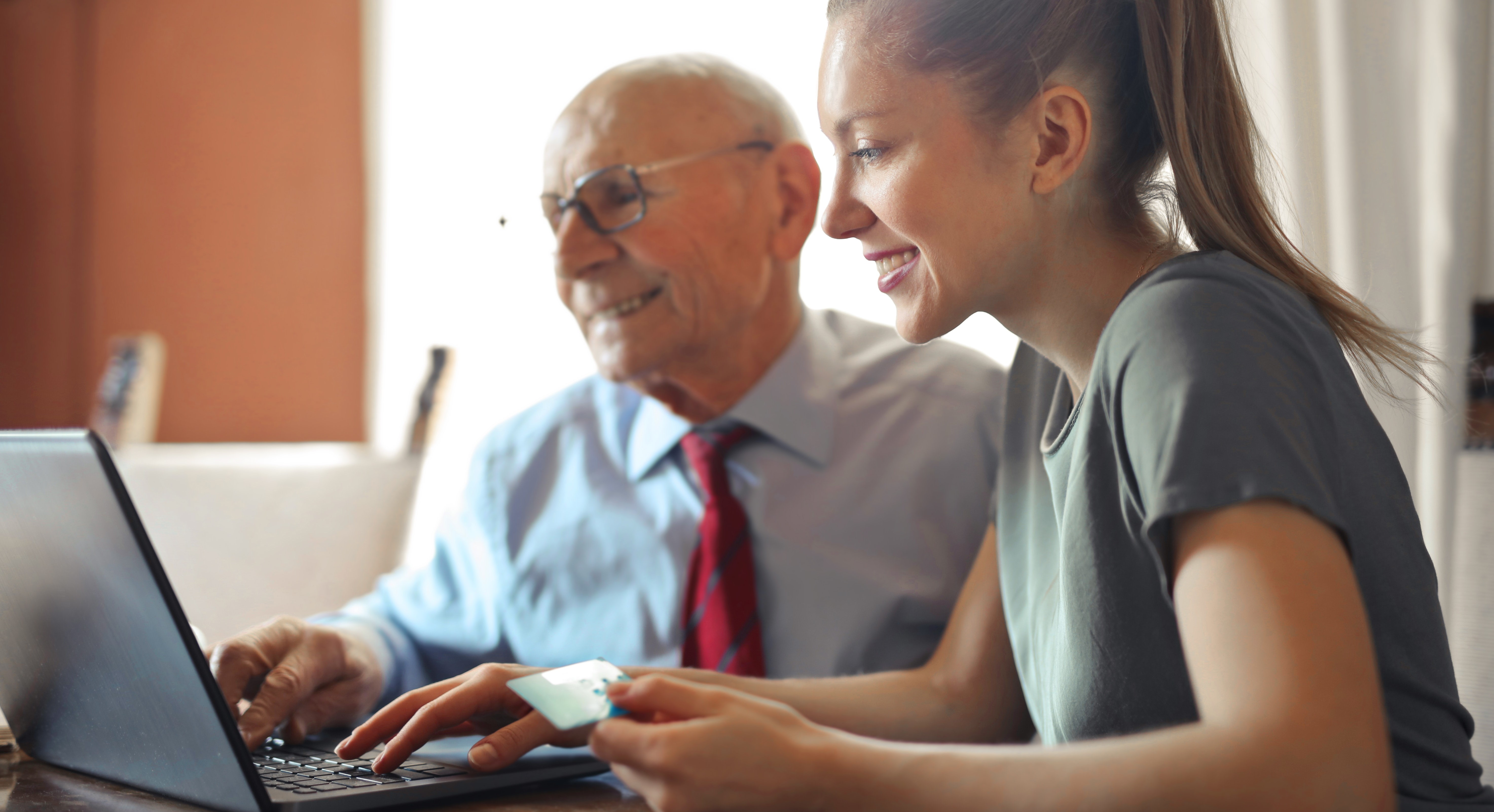 dad and daughter at laptop