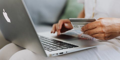 woman laptop credit card